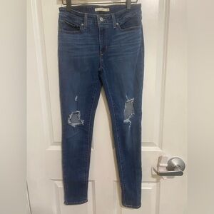 Distressed Levi skinny jeans